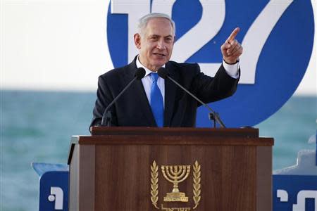 Israel's Prime Minister Benjamin Netanyahu speaks during a graduation ceremony of Israeli naval officers in the northern city of Haifa September 11, 2013. REUTERS/Baz Ratner