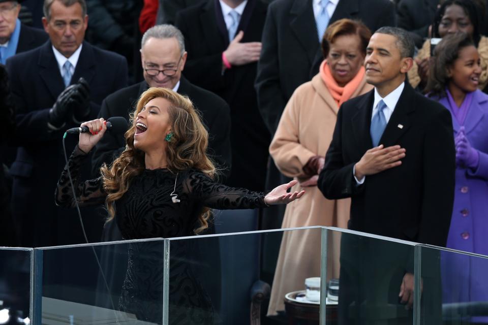 Beyoncé performs the national anthem as U.S. President Barack Obama looks on during the presidential inauguration on the West Front of the U.S. Capitol January 21, 2013 in Washington, DC. Barack Obama was re-elected for a second term as President of the United States. (Photo by Alex Wong/Getty Images)