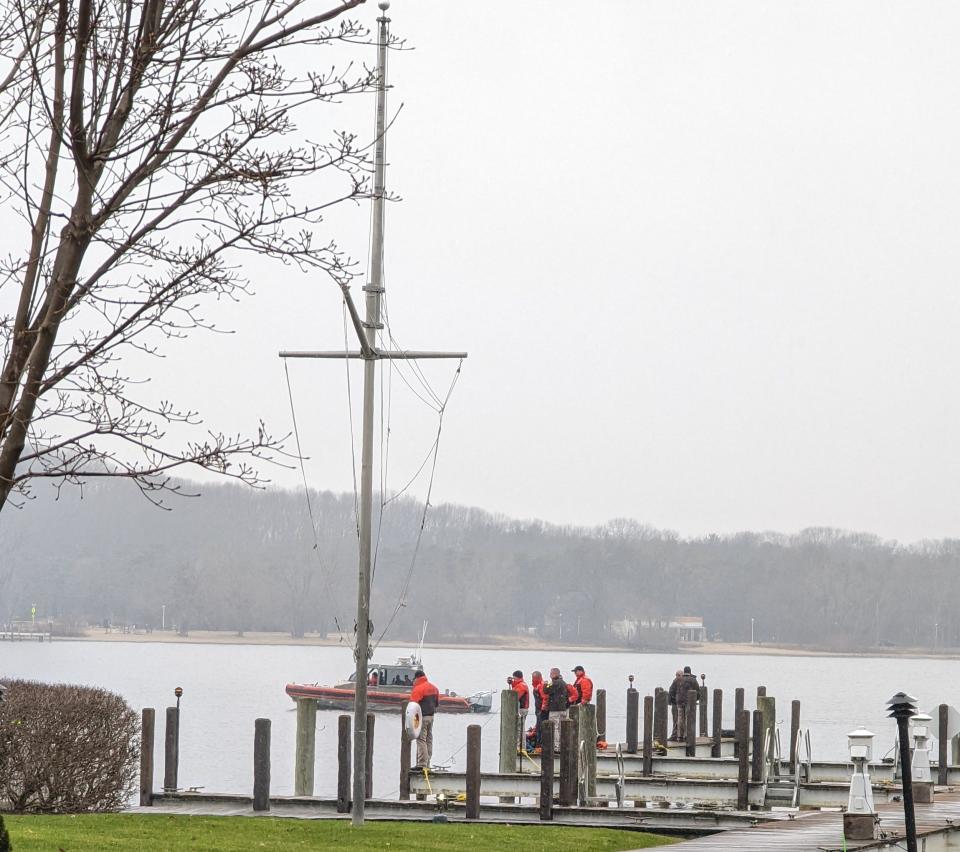 Divers with the Ottawa County Sheriff's Office located and removed a fully submerged vehicle from Lake Macatawa on Sunday, Jan. 22.