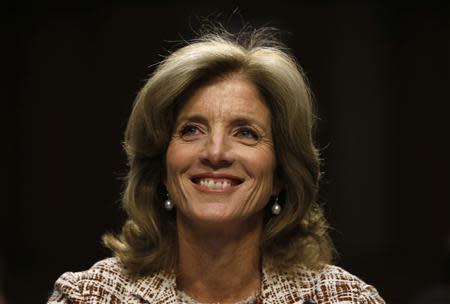 Caroline Kennedy, daughter of former U.S. President John F. Kennedy, smiles as she testifies at her U.S. Senate Foreign Relations Committee hearing on her nomination as the U.S. Ambassador to Japan, on Capitol Hill in Washington, September 19, 2013. REUTERS/Jason Reed
