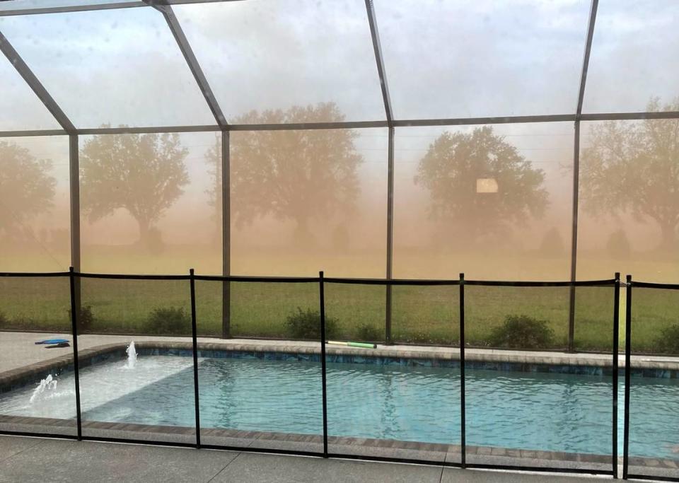 Manatee County Government officials have ​promised to hold developers accountable for dust storms that are caused by construction. A Foxbrook resident in Parrish took this photo of a large dust cloud caused by the Rye Ranch construction site.