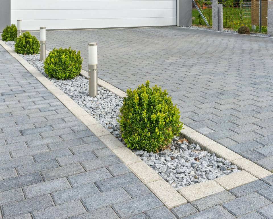 1. Integrate lights into driveway design features