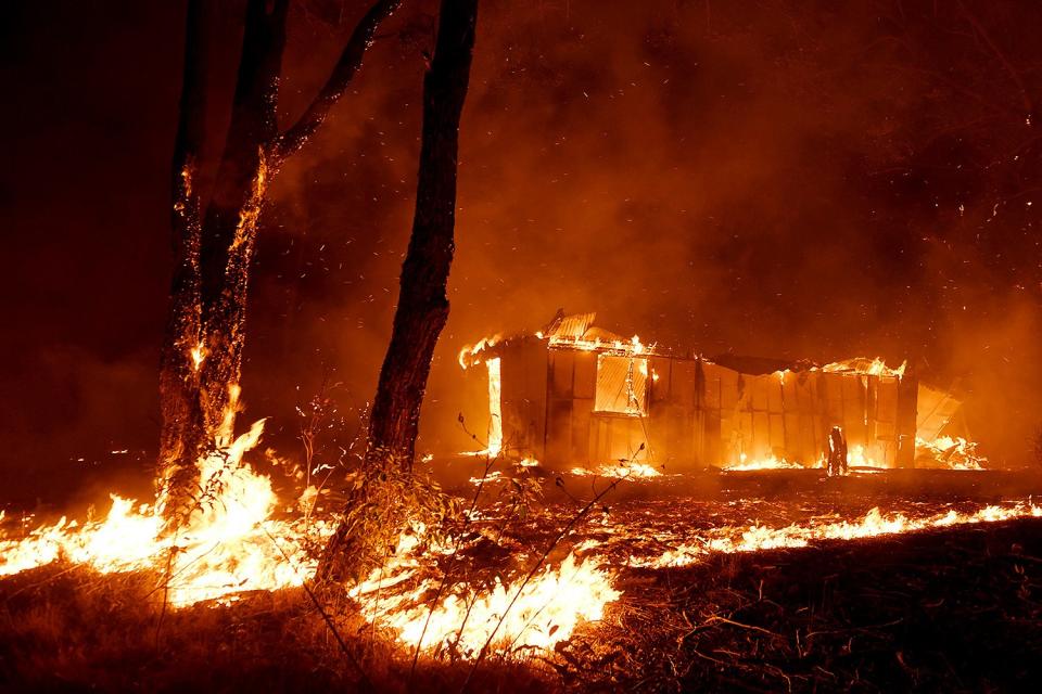 Bushfires destroy properties in the township of Hillville on the Mid North Coast of NSW, Nov. 12, 2019.