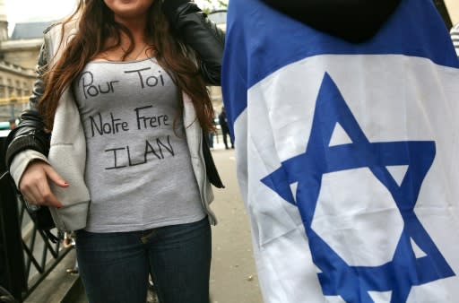 Halimi was tortured for three weeks. The slogan on the woman's T-shirt reads "For you, our brother Ilan"