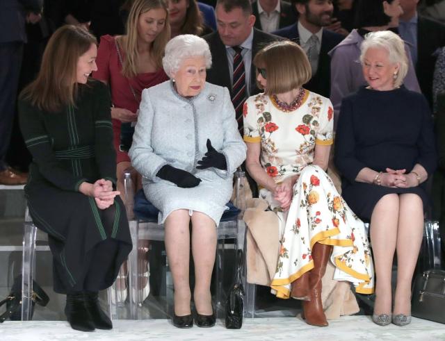 <div class="inline-image__caption"><p>Queen Elizabeth sits next to Vogue Editor-in-Chief Anna Wintour, British Fashion Council CEO Caroline Rush, and royal dressmaker Angela Kelly at London Fashion Week in 2018.</p></div> <div class="inline-image__credit">REUTERS/Yui Mok/Pool</div>