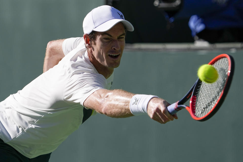 Andy Murray, of Britain, returns a shot to Tomas Martin Etcheverry, of Argentina, at the BNP Paribas Open tennis tournament Thursday, March 9, 2023, in Indian Wells, Calif. (AP Photo/Mark J. Terrill)