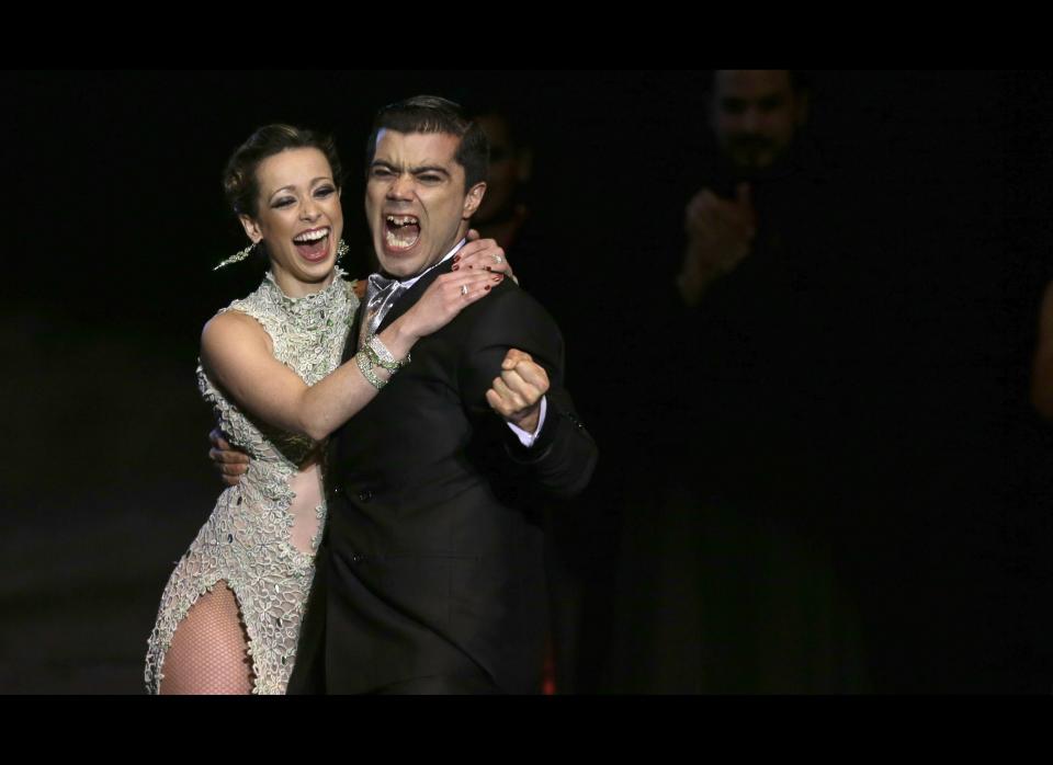 Argentina's Cristian Sosa and Maria Noel Sciuto celebrate winning the 2012 Tango Dance World Cup stage finals in Buenos Aires on Aug. 28, 2012.