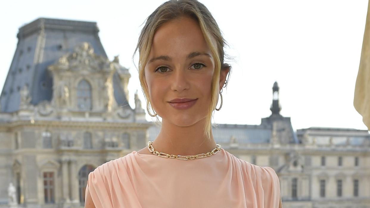 Lady Amelia Windsor in a pink dress with her hair up