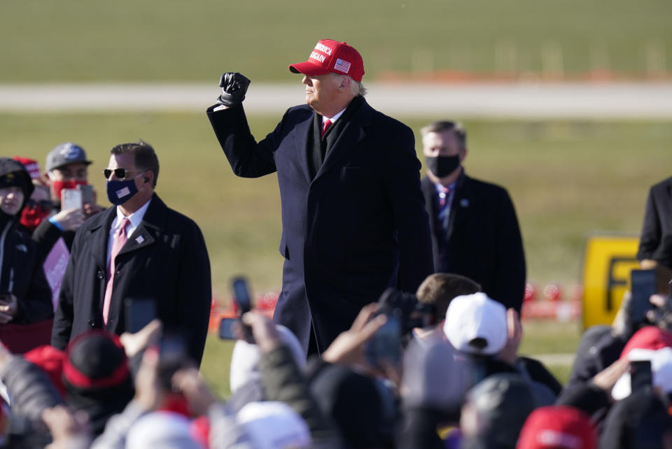 President Donald Trump arrives at a campaign rally at Dubuque Regional Airport, Sunday, Nov. 1, 2020, in Dubuque, Iowa. (AP Photo/Charlie Neibergall)
