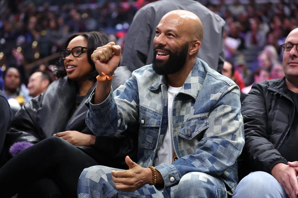 Jennifer Hudson sits with Common during the first half of a game between the LA Clippers and the Toronto Raptors at Crypto.com Arena on Jan. 10, 2024, in Los Angeles.