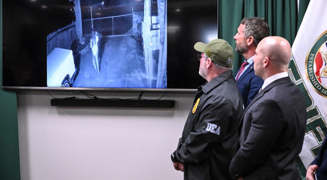 Agents from cooperating agencies watch released video Friday, February 3, 2023 showing Alyssa Parraz, 16, fleeing with her baby from gunmen on January 16. Six people in Goshen were killed that morning. Two suspects were apprehended Friday, one in Visalia, another just blocks away from the crime scene during a multi-agency operation named Nightmare. 