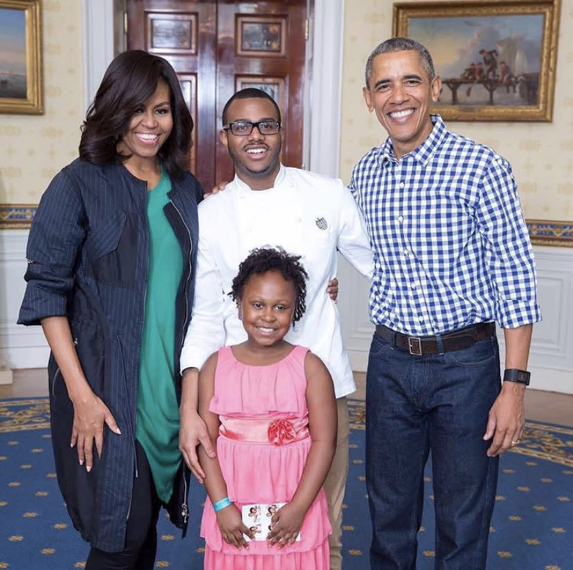 Chef Kwame Onwuachi with Michelle and Barack Obama and his niece at the White House Easter Egg Hunt.