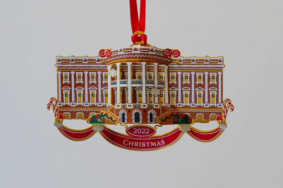 The two-sided ornament, designed by Kim Oliva, shows both the north and south fronts of the executive mansion.