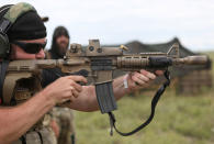 <p>Members of self-described patriot groups and militias run through shooting drills during III% United Patriots’ Field Training Exercise outside Fountain, Colo., July 29, 2017. (Photo: Jim Urquhart/Reuters) </p>