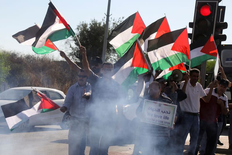 Activists protest against Israeli settlement activity in West Bank