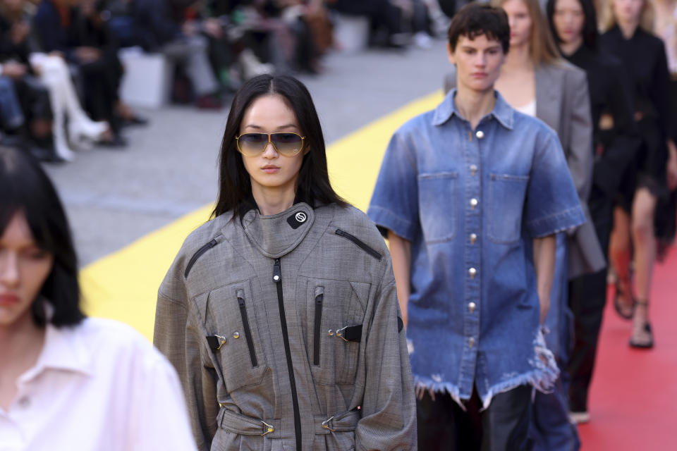 Models wear creations for the Stella McCartney ready-to-wear Spring/Summer 2023 fashion collection presented Monday, Oct. 3, 2022 in Paris. (Photo by Vianney Le Caer/Invision/AP)