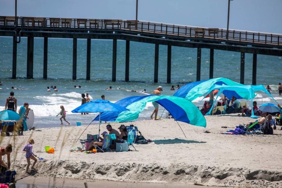 Shibumi Shades are set up near the Springmaid Pier in Myrtle Beach. In the summer heat of July, Myrtle Beach area residents and tourist look to the water for relief. With waterparks, jet ski rentals, parasails, banana boat rides, paddle boards and kayaks, there are plenty of options to beat the heat. July 5, 2022.