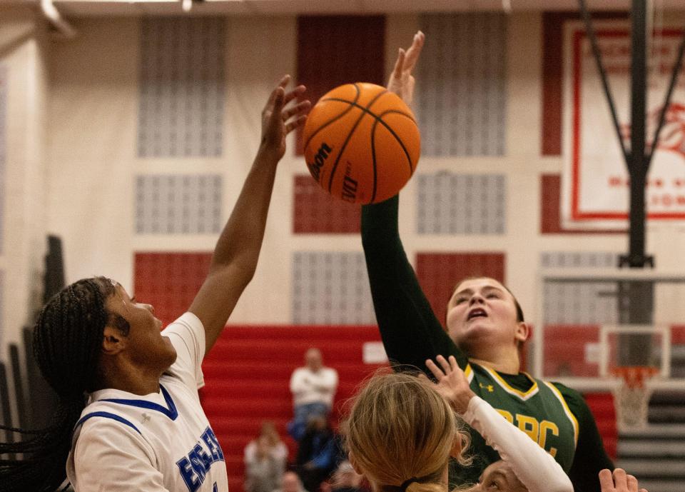 RBC's Tessa Carman pulls in a rebound.