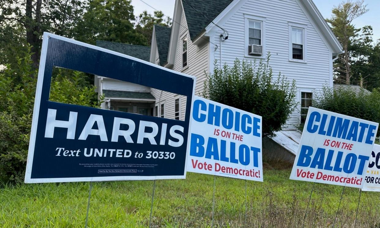 <span>A campaign sign with Joe Biden's name cut out stands in Northwood, New Hampshire, on Sunday.</span><span>Photograph: Holly Ramer/AP</span>