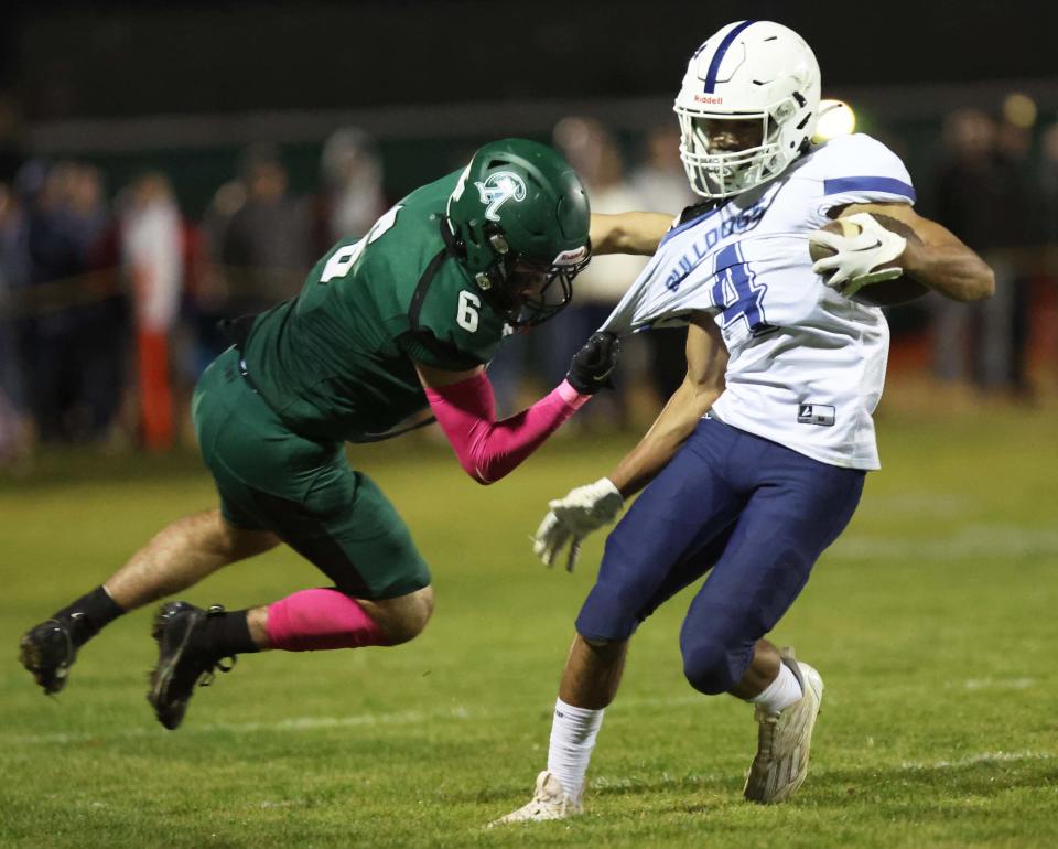 Rockland's Terran Williams is tackled by Abington's William LeBlanc during a game on Friday, Oct, 13, 2023.