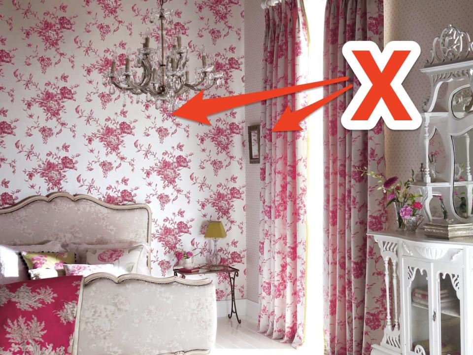 pink floral wallpaper bedroom with skitch