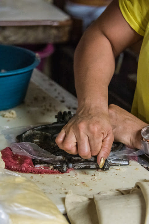 Someone making tortillas