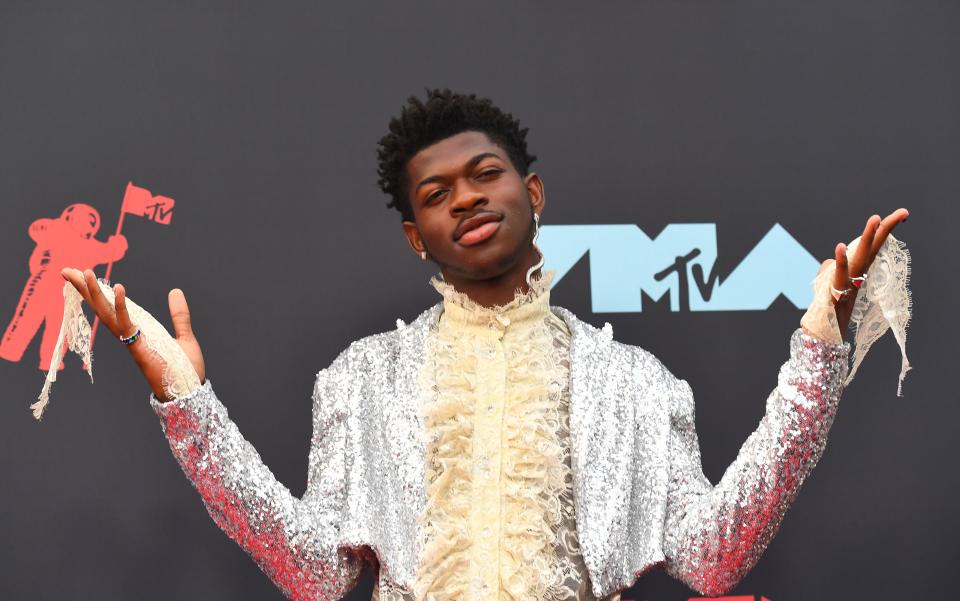 US rapper Lil Nas X arrives for the 2019 MTV Video Music Awards at the Prudential Center in Newark, New Jersey on August 26, 2019. (Photo by Johannes EISELE / AFP)        (Photo credit should read JOHANNES EISELE/AFP/Getty Images)