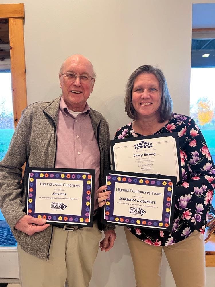 Cheryl Benway and her father, Jim Prinz, were honored after raising more than $10,000 this year for Alzheimer's research.