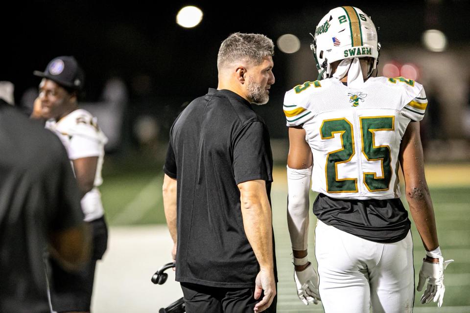 Savannah Country Day coach John Mohring talks with Tyler Scott during a recent game.