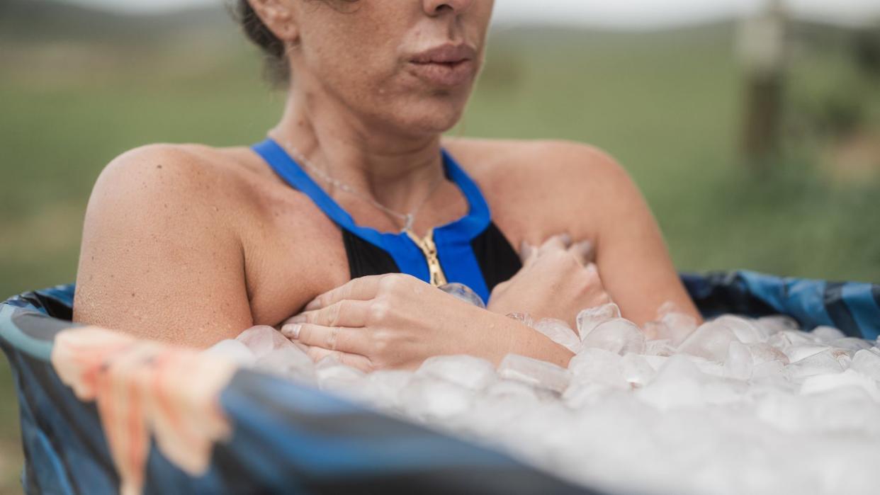 woman inside a iced bath tube