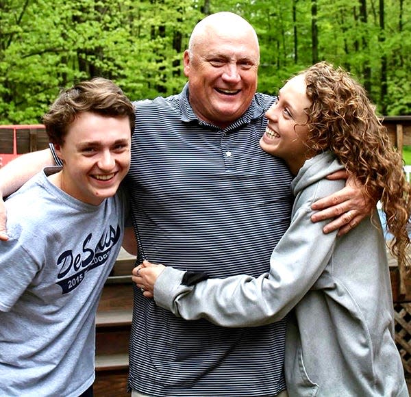 Longtime Honesdale assistant boys basketball coach Mike Birmelin (center) passed away Saturday following a short courageous battle with pancreatic cancer. Mike is pictured here with his two children Grady (left) and Morgan (right).