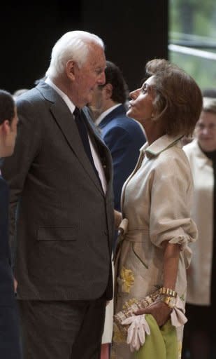 French fashion designer Hubert de Givenchy (L) talks to Spanish socialite and former fashion model Nati Abascal (R) as they attend the inauguration of the Cristobal Balenciaga museum. Balenciaga's home village of Getaria in Spain's northern Basque region has opened a museum that shows some 90 of his works