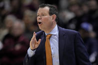 Langston head coach Chris Wright talks to his players during the first half of the NAIA men's national championship college basketball game against Freed-Hardeman, Tuesday, March 26, 2024, in Kansas City, Mo. (AP Photo/Charlie Riedel)