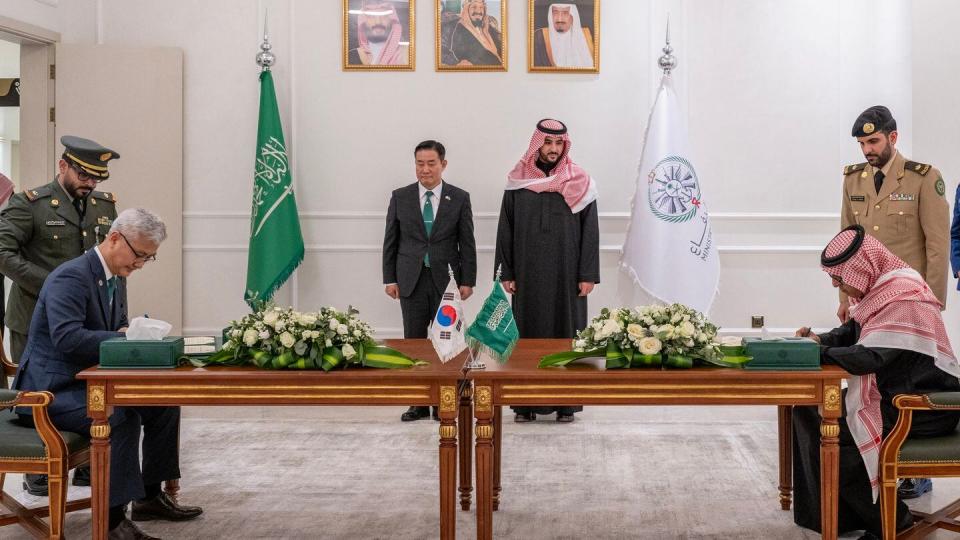 Representatives of South Korea and Saudi Arabia sign a defense cooperation agreement in Riyadh on Feb. 4, 2024. (South Korea Defense Ministry)