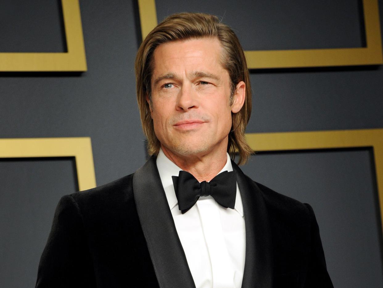 Brad Pitt poses with his Oscar in the press room during the 92nd Annual Academy Awards at Hollywood and Highland on February 09, 2020 in Hollywood, California