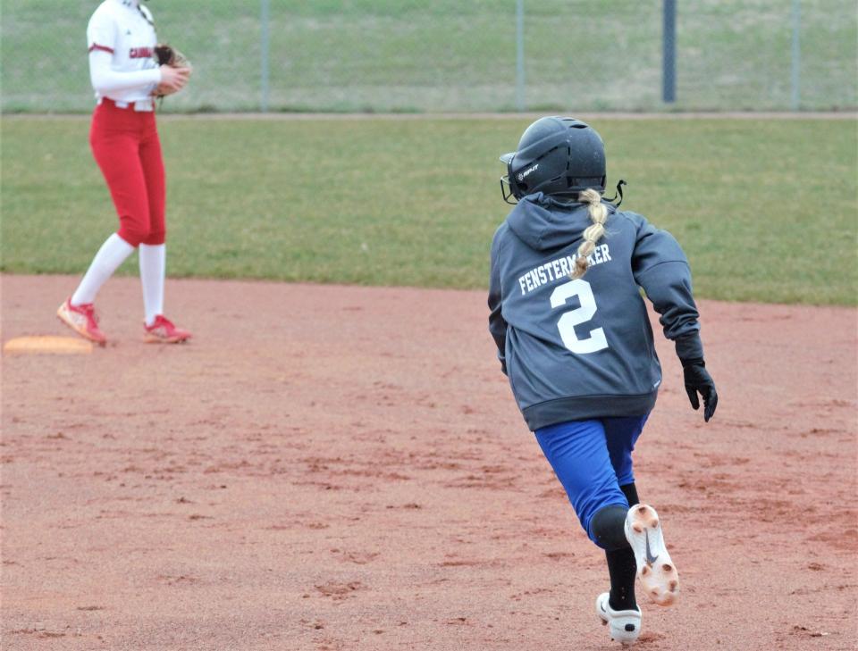 Inland Lakes' Adyson Fenstermaker heads for second base during a doubleheader softball game at Johannesburg-Lewiston on Friday.