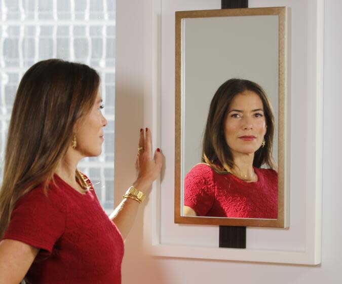 In this Jan. 12, 2018, photo, divorce attorney Laura Wasser, who has represented celebrities like Britney Spears and Johnny Depp, poses at her Century City office in Los Angeles. On Thursday, Jan. 25, Wasser is launching a new website and service called, It's Over Easy, that aims to help couples get divorced online without having to hire an attorney or set foot into a courthouse. (AP Photo/Damian Dovarganes)