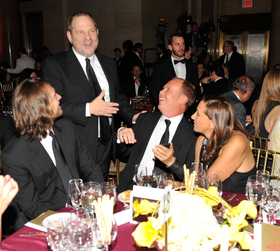 Donna Karan, right, pictured with Harvey Weinstein, second from left, at the amfAR New York Gala in 2011. (Photo: Kevin Mazur/Getty Images)