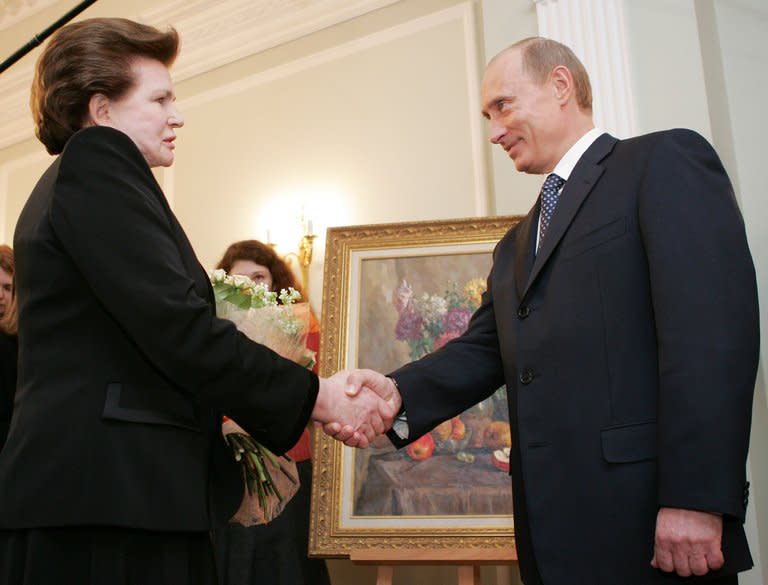 Russian President Vladimir Putin (R) greets Valentina Tereshkova, the first woman-cosmonaut in space, during their meeting on Tereshkova's 70th birthday, in Novo-Ogaryovo outside Moscow, on March 6, 2007