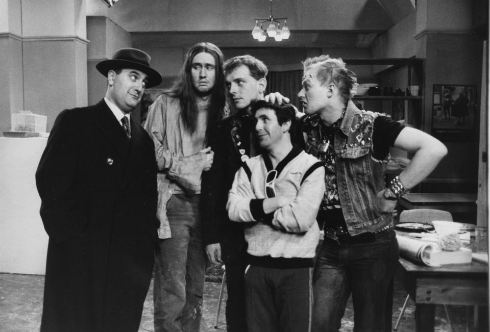 Old pals: Sayle with Nigel Planer, Rik Mayall, Christopher Ryan and Ade Edmondson in The Young Ones in 1982 - Getty 