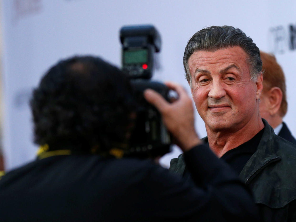 Sylvester Stallone poses at the premiere of "The Promise" in Los Angeles, California: REUTERS/Mario Anzuoni