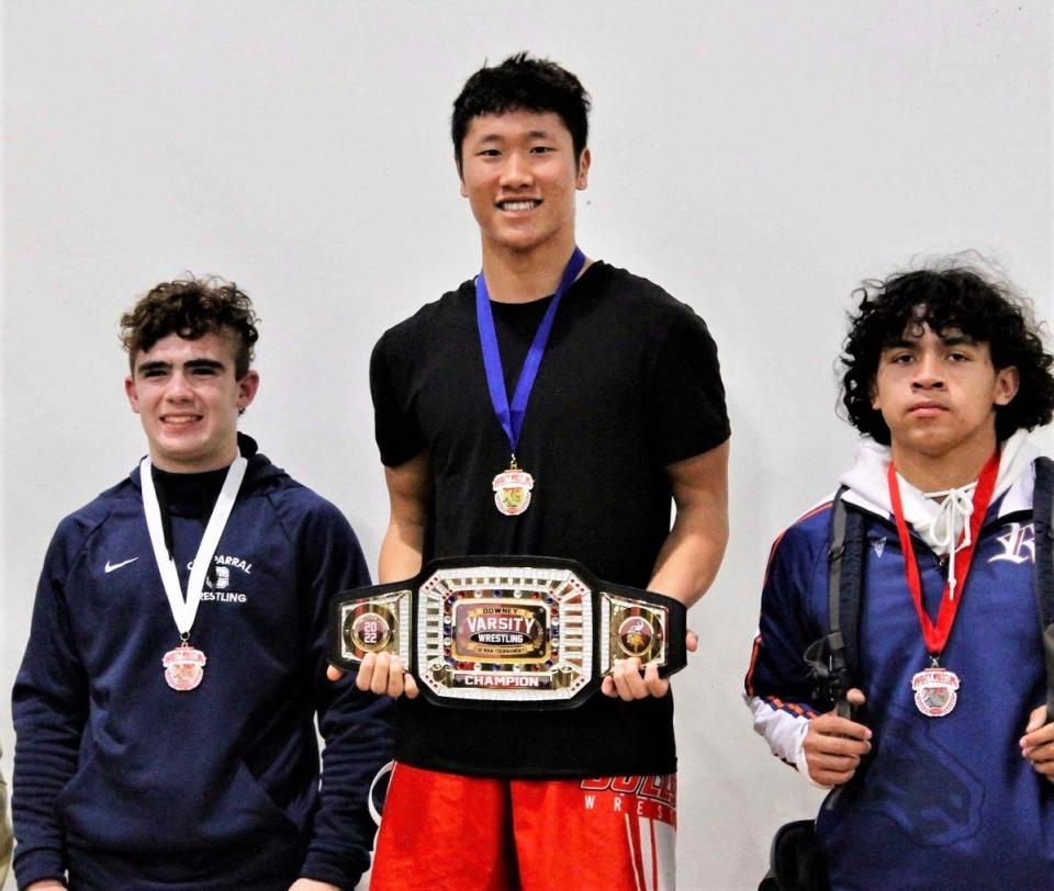 Oak Hills' Julian Jeong poses with his 160-pound title at the Downey 32 tournament over the weekend.