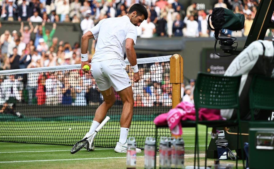 Novak Djokovic, pictured here smashing his racquet into the net post during the Wimbledon final against Carlos Alcaraz.