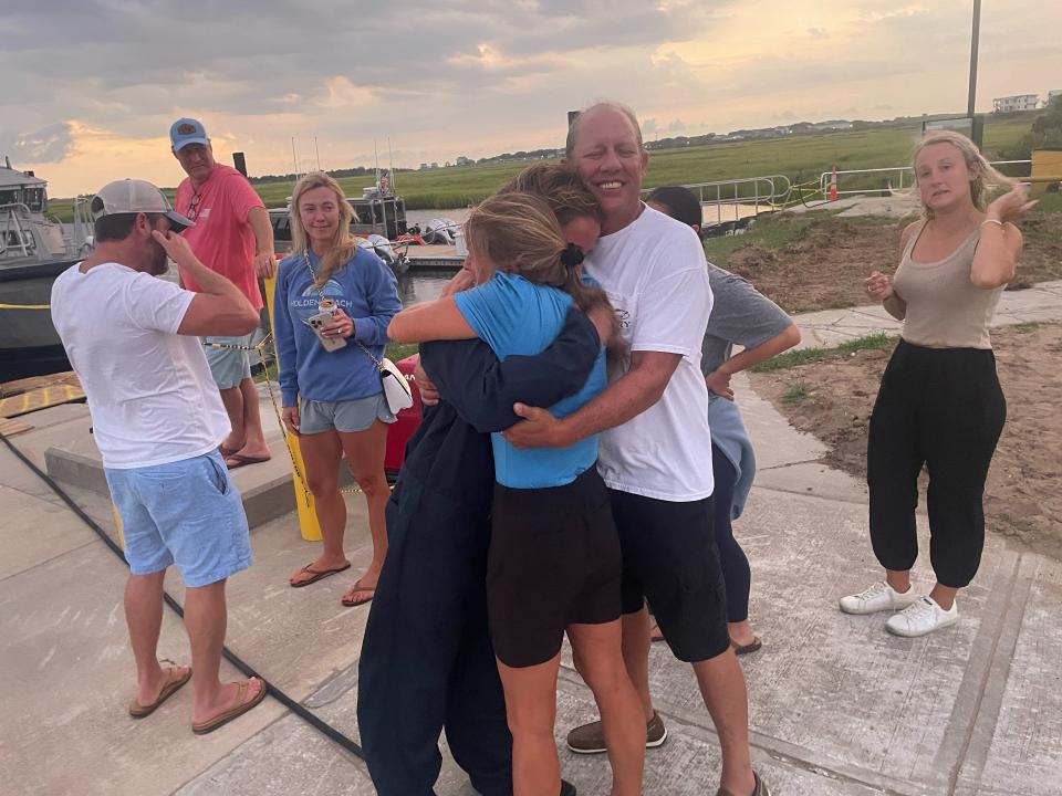 Missing divers off the coast of North Carolina were reunited with their families early Monday.
