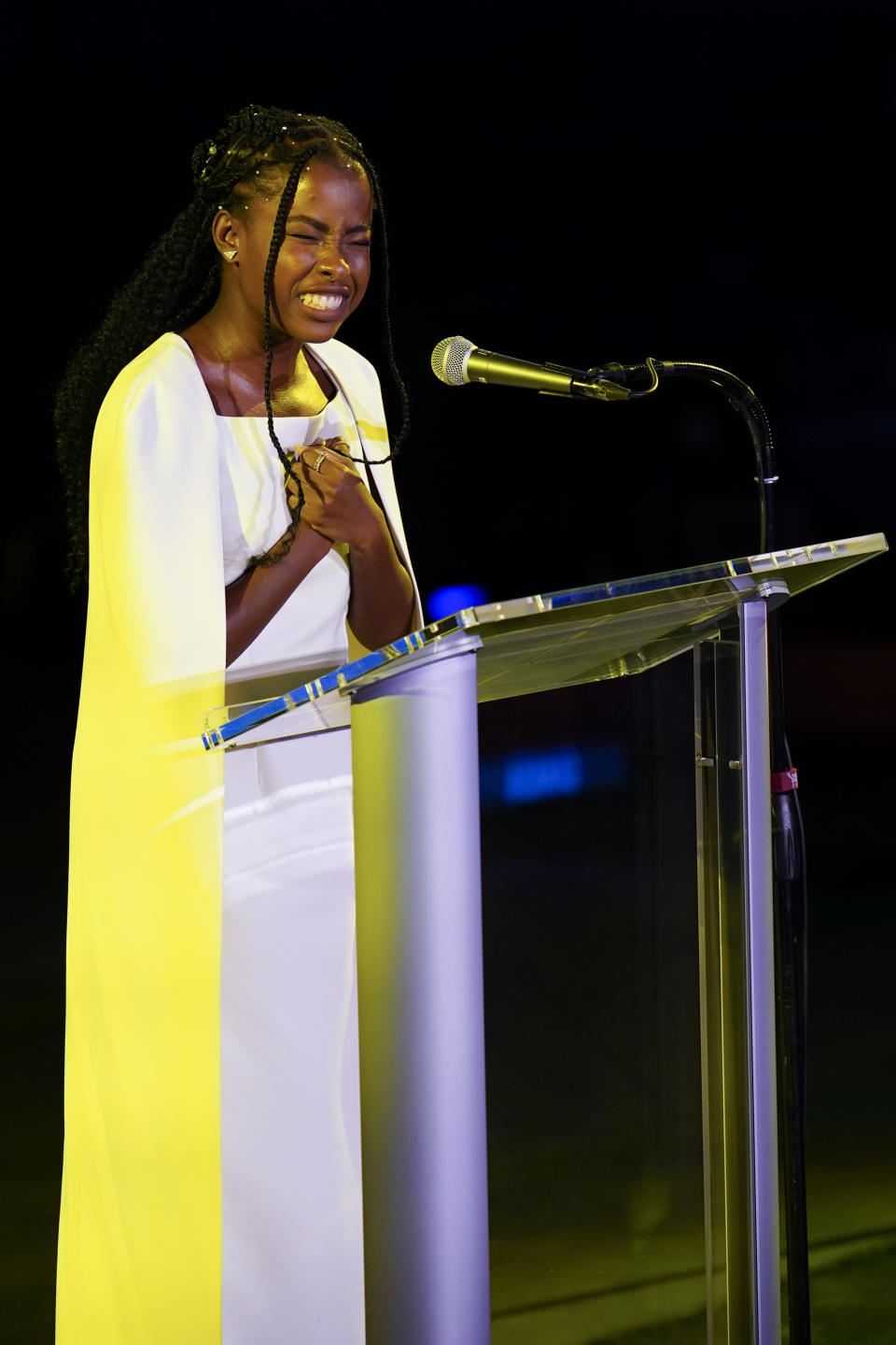 Amanda Gorman recites a poem during an event called "SDG Moment" at United Nations headquarters, Monday, Sept. 19, 2022. The event is meant to highlight the urgency and importance of the United Nations' sustainable development goals. (AP Photo/Seth Wenig)