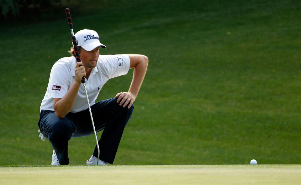 CHARLOTTE, NC - MAY 06: Webb Simpson of the United States lines up his putt on the eighth hole during the final round of the Wells Fargo Championship at the Quail Hollow Club on May 6, 2012 in Charlotte, North Carolina. (Photo by Streeter Lecka/Getty Images)