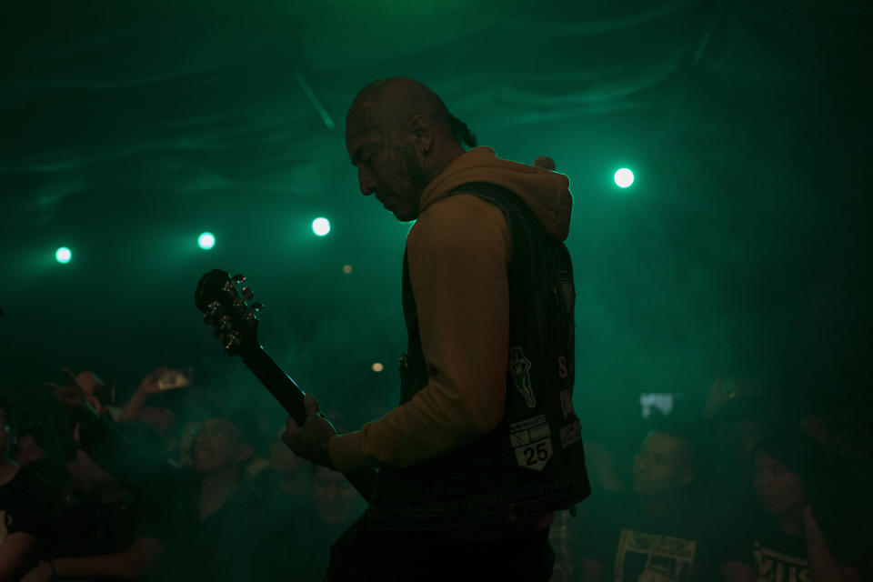 Pepe, of the Mexican Punk Rock band Seguimos Perdiendo, performs during one of the last active weekends at the iconic counterculture venue Multiforo Alicia in Mexico City, Friday, Feb. 17, 2023. After 27 years, Multiforo Cultural Alicia closed its doors forever. For many, it marks an end of an era, and a sign of the toll gentrification has taken on the city in recent years. (AP Photo/Eduardo Verdugo)