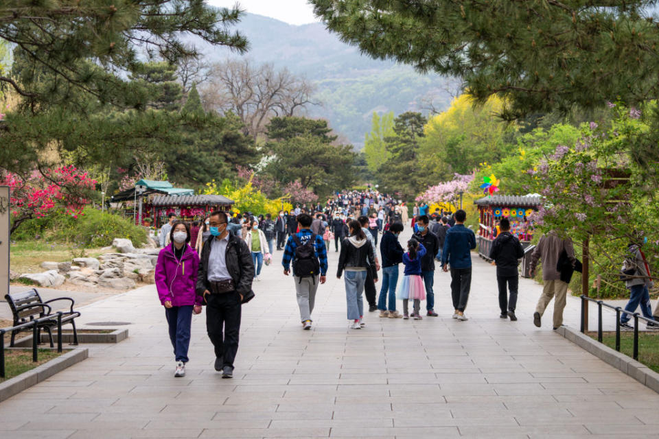 BEIJING, CHINA - APRIL 13, 2021: People walk in the Beijing Botanical Garden. Beijing has not registered any local COVID-19 cases for over 70 days; over 10 mln Beijing residents have received at least one COVID-19 vaccine dose. Artyom Ivanov/TASS (Photo by Artyom Ivanov\TASS via Getty Images)