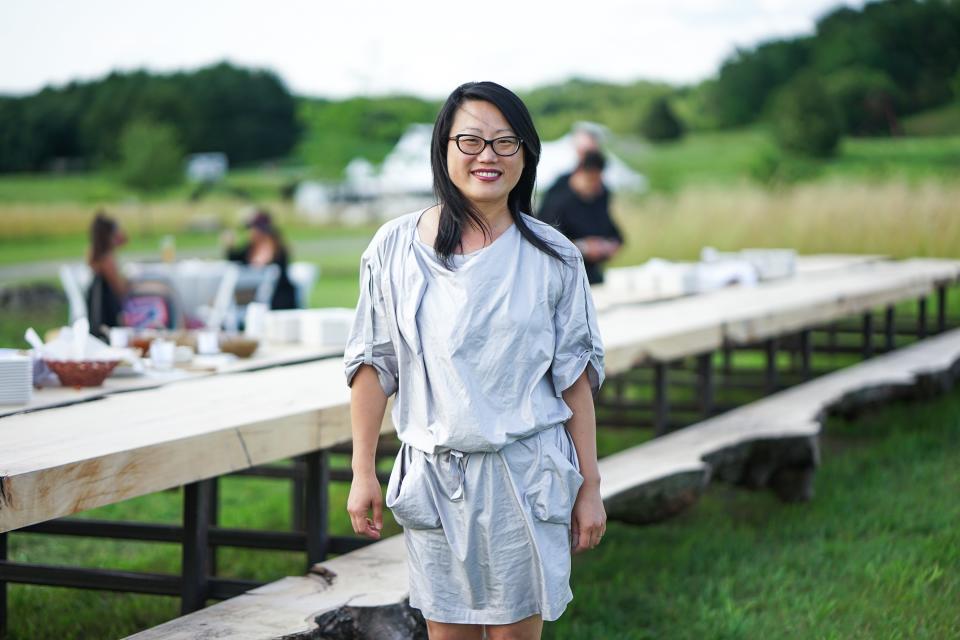 Artist Jean Shin in front of her work, Allée Gathering