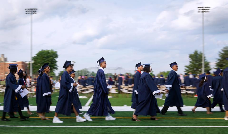 Hope High School seniors parade into Conley Stadium for the school's commencement in 2021.